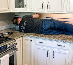 You might want to climb onto your countertops to copy this gorgeous $50 kitchen idea