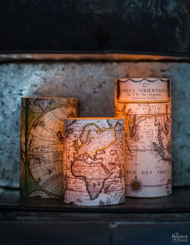 s 15 decor items you can transform by decoupaging, Their antique world map decoupaged candles