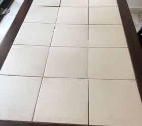 Is this warping tile tabletop fixable?