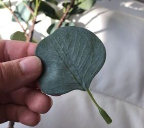 Use some faux branches from your IKEA to copy this trendy living room accent