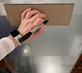 She traces a cardboard square on her air duct for this quick and easy hack
