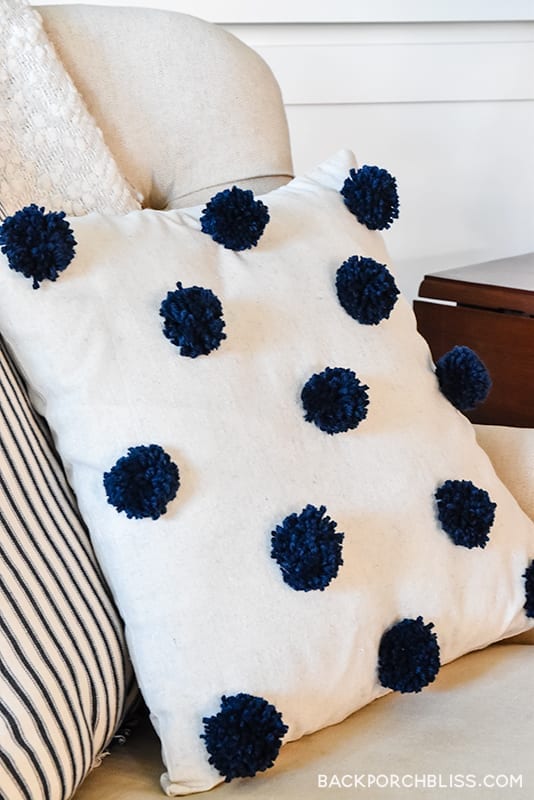 wait until you see this pom pom pillow