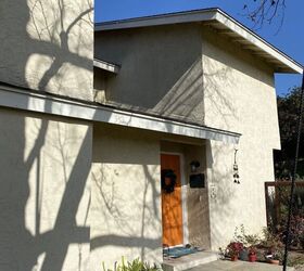 She was sick of staring at her peeling exterior paint, so she gave her home a striking makeover