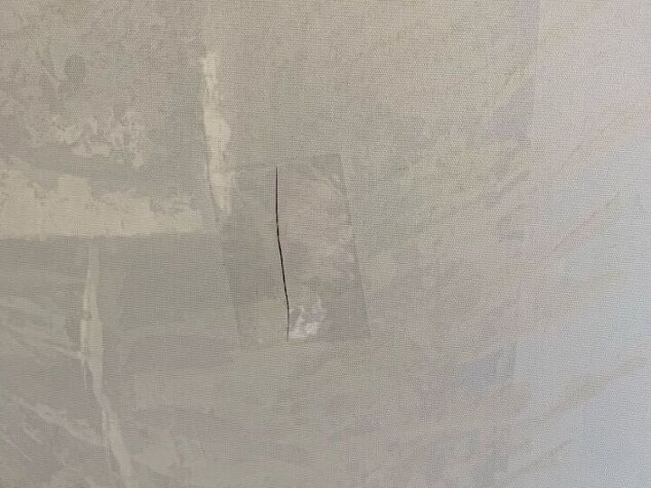 q how to fix a tear in a canvas print
