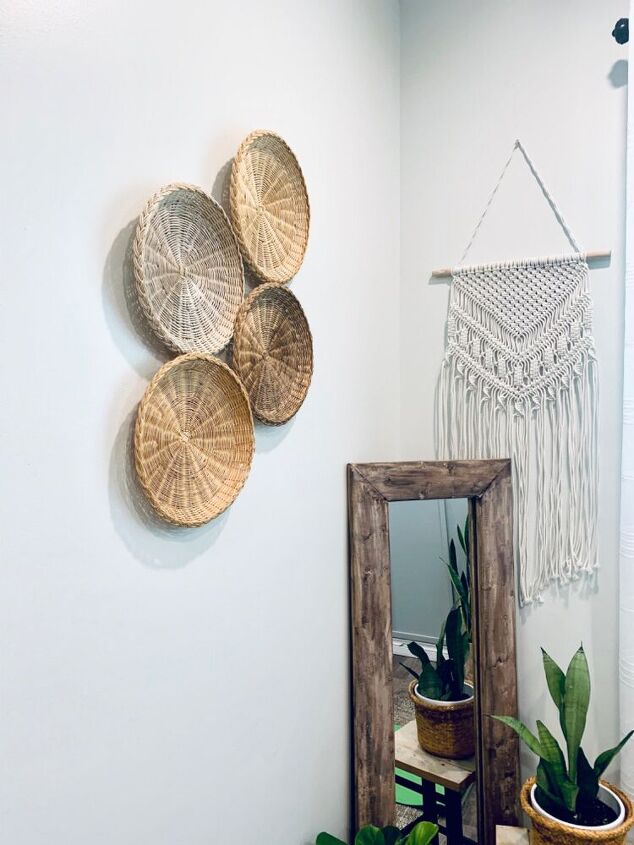s 25 decor ideas that ll make your living room look magazine worthy, This simple basket statement wall