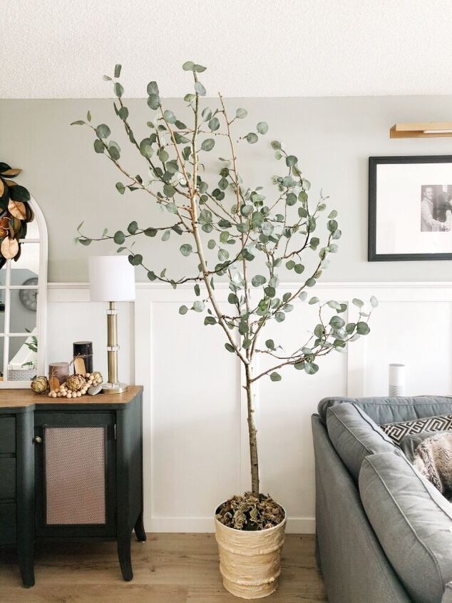 s 25 decor ideas that ll make your living room look magazine worthy, A gorgeous faux eucalyptus tree