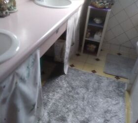 q what can i do under the counter to cover up my bathroom supplies