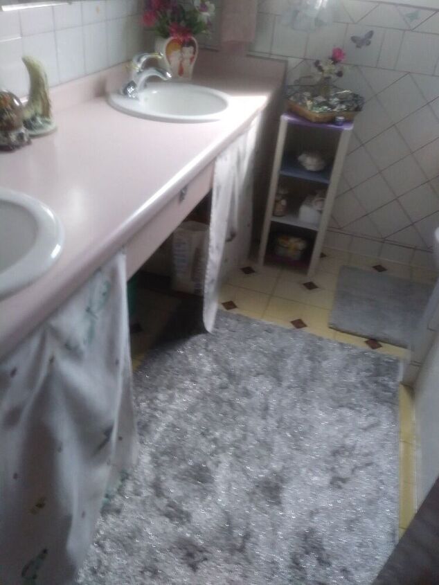 q what can i do under the counter to cover up my bathroom supplies