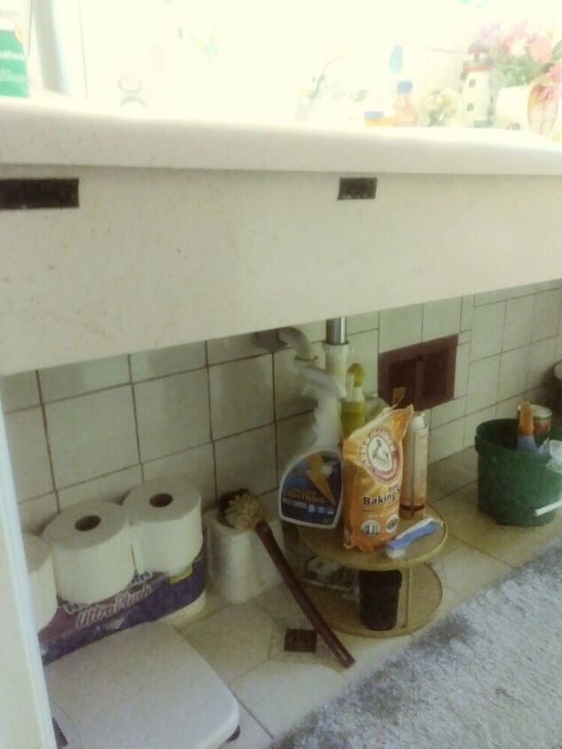 q what can i do under the counter to cover up my bathroom supplies