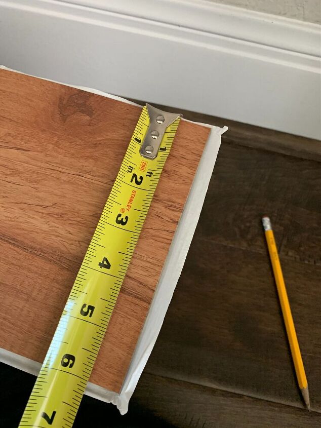 obtenga el aspecto de madera de granero mediante el uso de pisos de vinilo