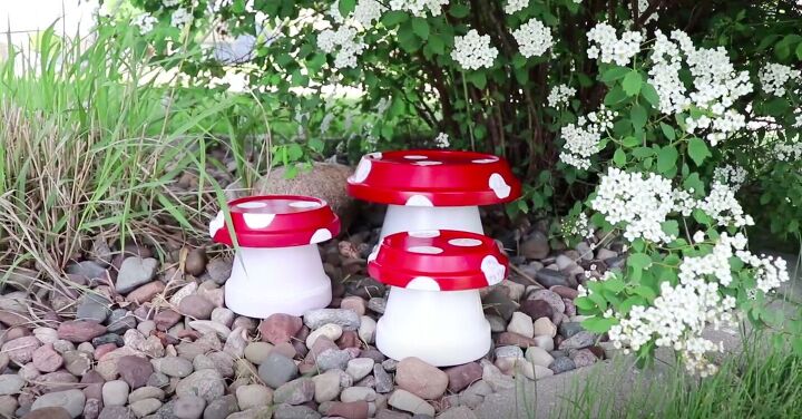 20 whimsical garden ideas that ll make your neighbors stop and stare, This magical mushroom decor