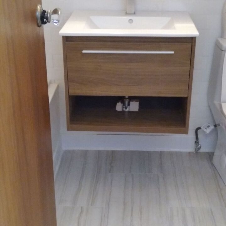 hiding plumbing on floating vanity