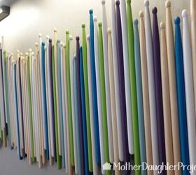 s 16 ideas for showcasing your love for music, This colorful drumstick wall art