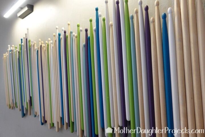 s 16 ideas for showcasing your love for music, This colorful drumstick wall art