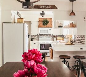 12 stunning ways to fill the space above your stove, Screw in a stylish rustic vent hood cover