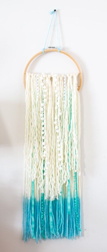 how to make a charming and affordable yarn boho wall hanging