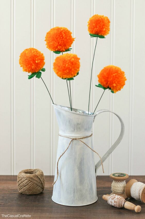 s make your space a cheery haven with 15 pom pom diys, A fun Anthropologie knock off bouquet