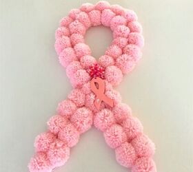 s make your space a cheery haven with 15 pom pom diys, This pink ribbon breast cancer awareness wreath