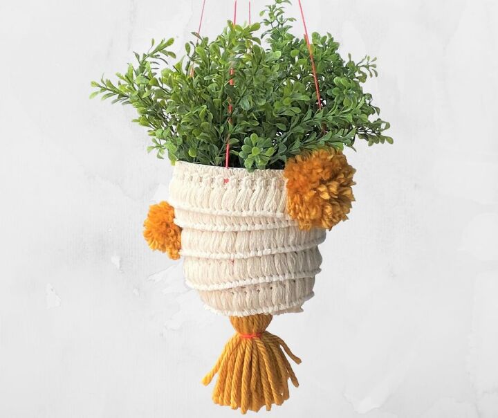 s make your space a cheery haven with 15 pom pom diys, This hanging Boho planter