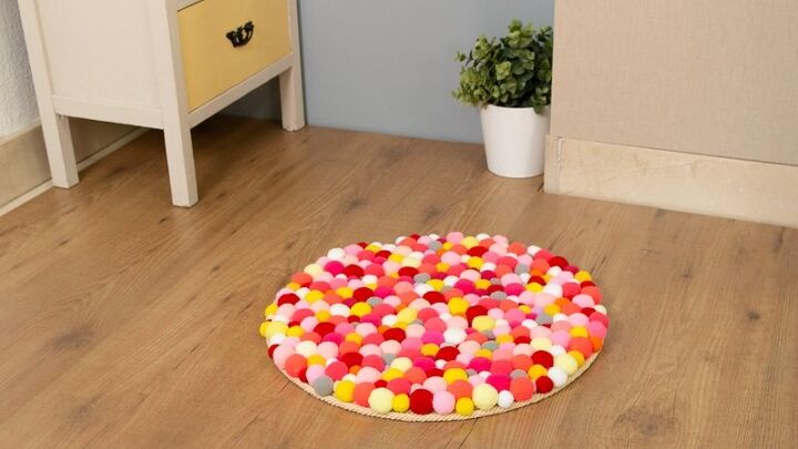 s make your space a cheery haven with 15 pom pom diys, A colorful customizable rug