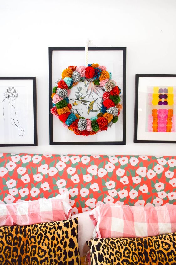 s make your space a cheery haven with 15 pom pom diys, This fun colorful yarn wreath