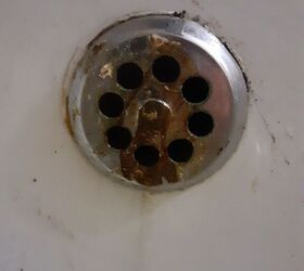 q how do i get this drain off the tub