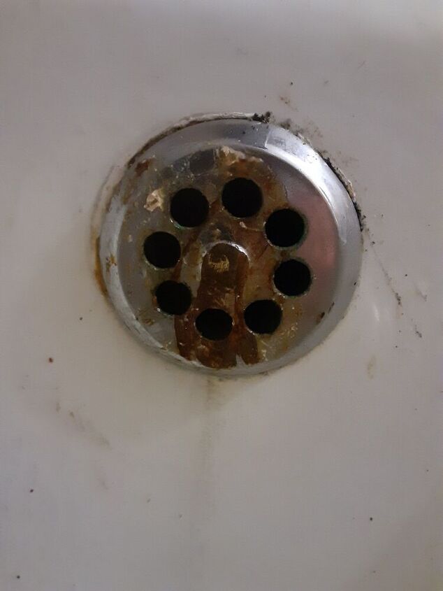 q how do i get this drain off the tub