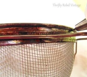 repurposed vintage sieve bird feeder