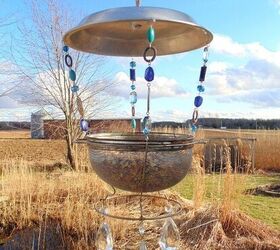 repurposed vintage sieve bird feeder
