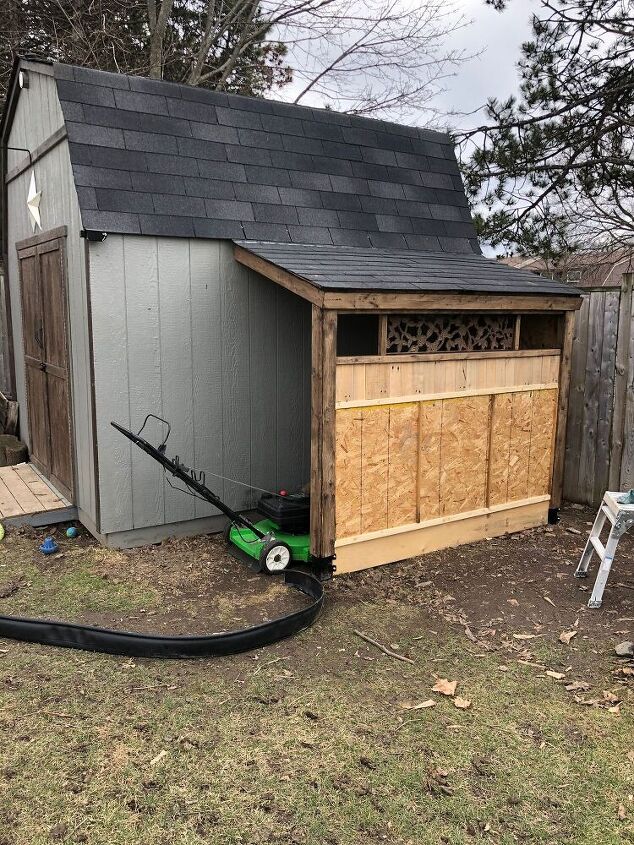 build this simple carport for your shed with mostly scrap materials