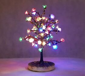 s 14 ways to make your home sparkle with fairy lights, Build a colorful fairy light tree