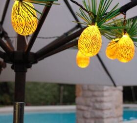 s 14 ways to make your home sparkle with fairy lights, String together pineapple lights from Easter eggs