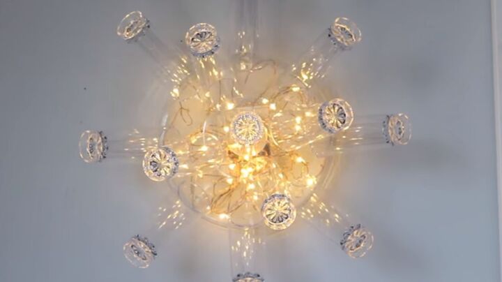 s 14 ways to make your home sparkle with fairy lights, Create a chandelier style decorative wall light