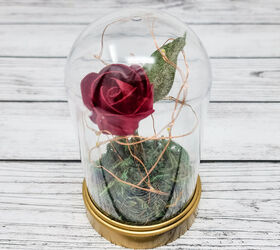 s 14 ways to make your home sparkle with fairy lights, Put together a beautiful floral cloche