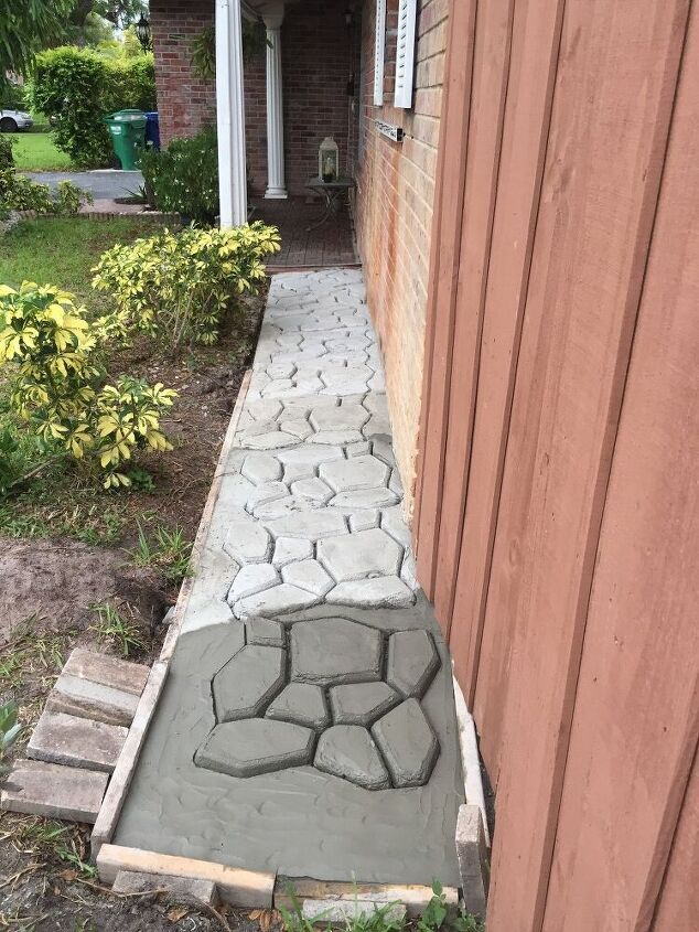 s 13 gorgeous garden paths we re obsessed with this season, Mold cement for a cobblestone look