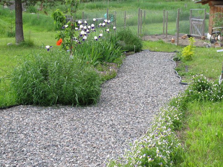 s 13 gorgeous garden paths we re obsessed with this season, Improve your pathway with gravel and edging