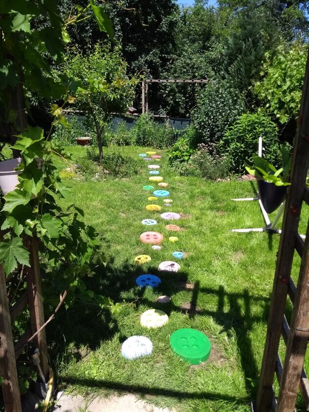 s 13 gorgeous garden paths we re obsessed with this season, Mold super cute stepping stones