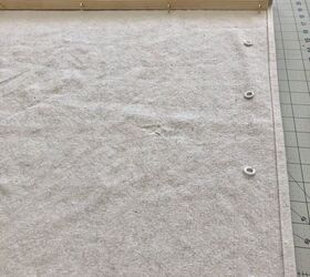 She adds plastic rings to a piece of dropcloth to get everyone's favorite trend in 3 hours