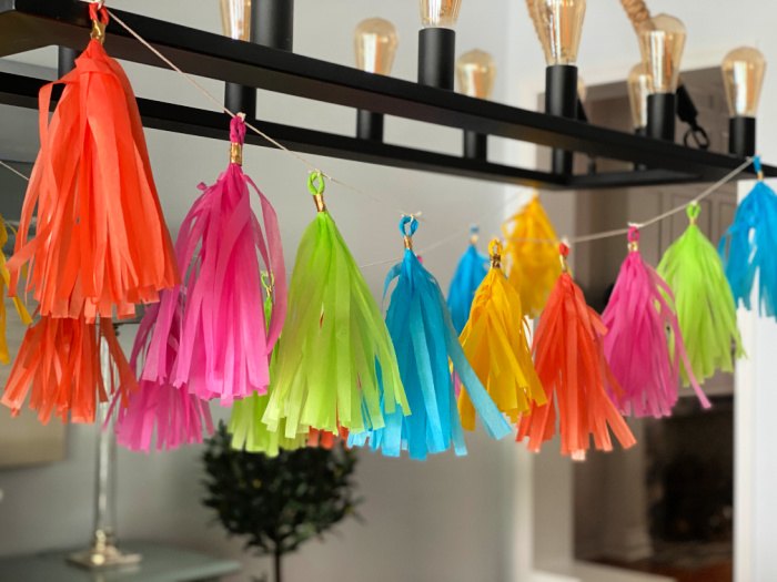 making a tissue paper garland with tassels