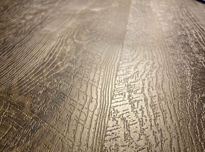 how do i fix vinyl plank flooring that is buckling