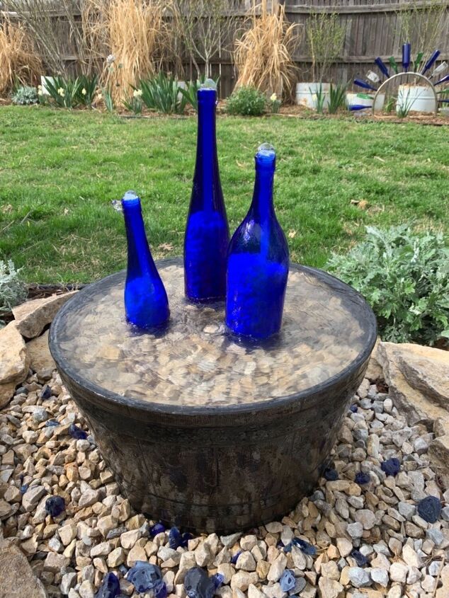 water fountain from wine bottles