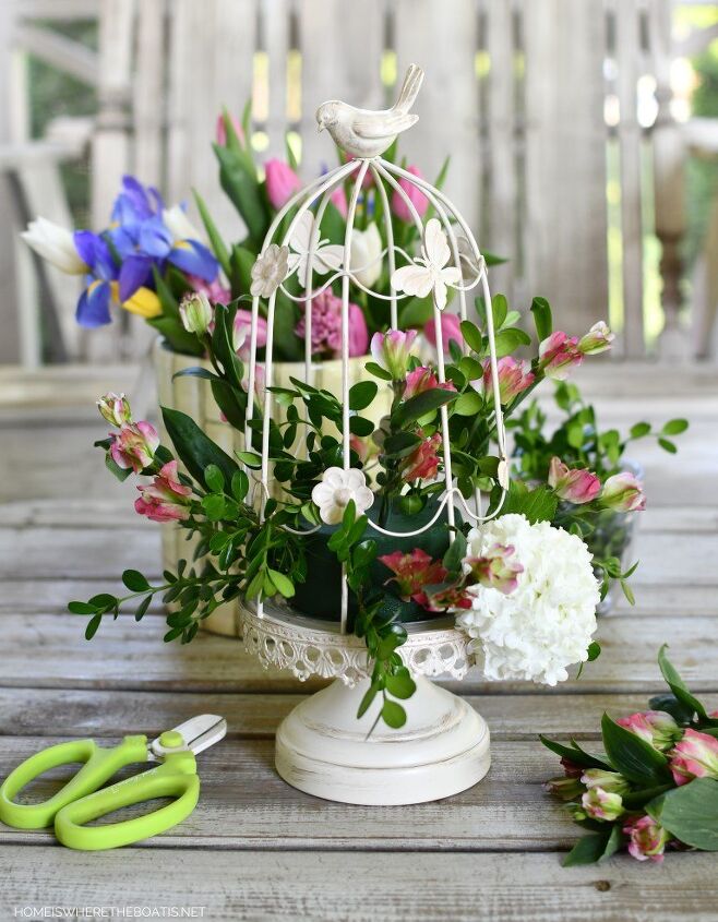 how to make a flower arrangement using a decorative bird cage