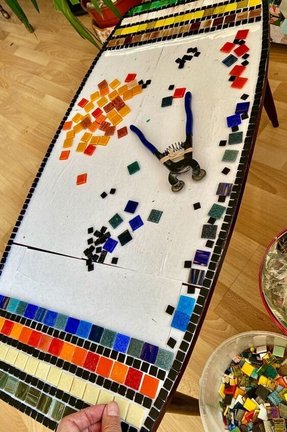transforming an old coffee table into rainbow of hope, Laying tiles