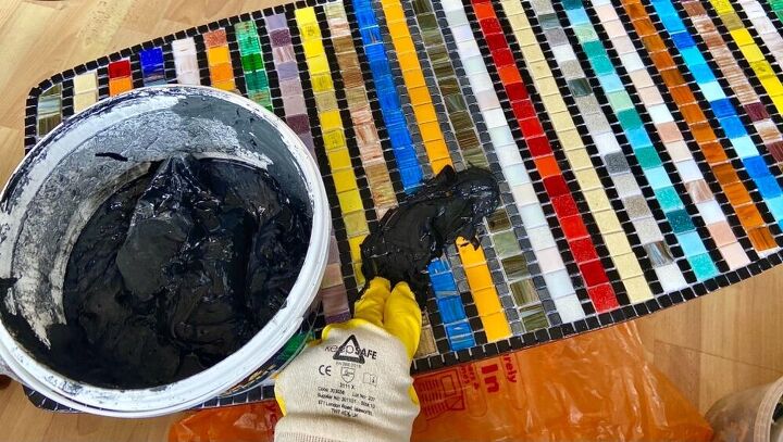 transforming an old coffee table into rainbow of hope, Grouting