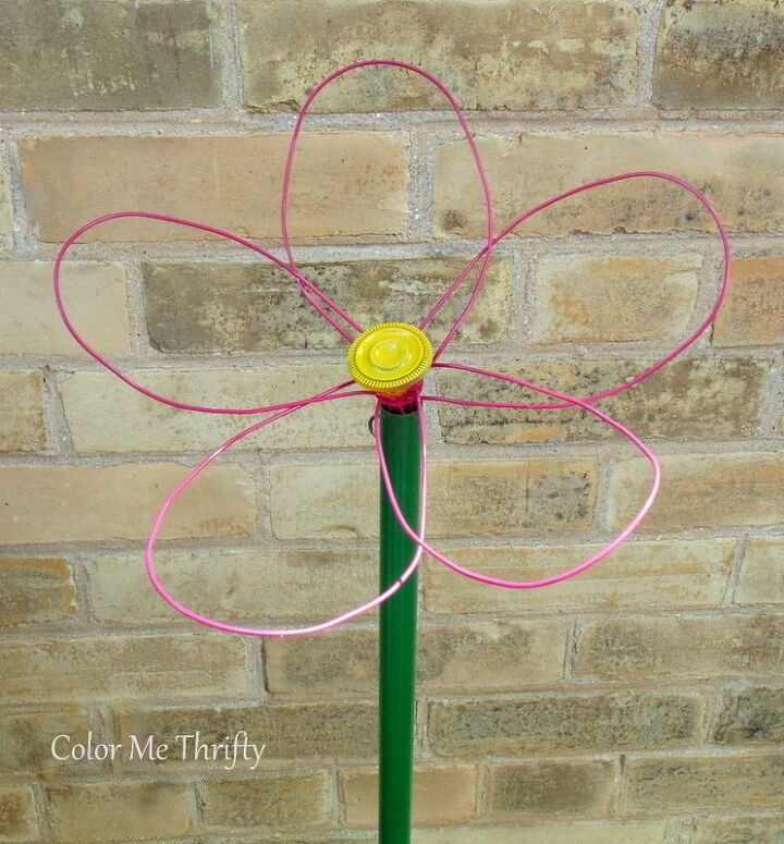 s 20 clever ways to repurpose old kitchenware, Spray paint fun whisk flowers