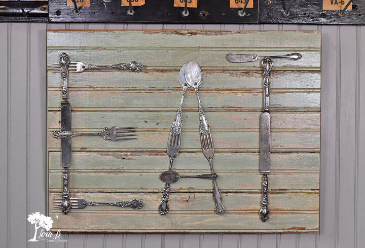 s 20 clever ways to repurpose old kitchenware, Flatten utensils for vintage wall art