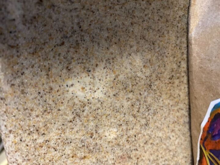 q white mark after scrubbing corian counter