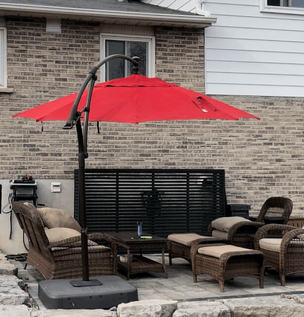 s the top 17 ways to improve your outdoor space before summer, Spray paint your faded umbrella
