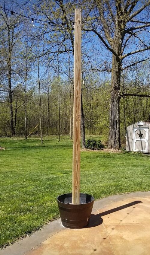 how to make diy string light metal posts, Wooden String Light Poles