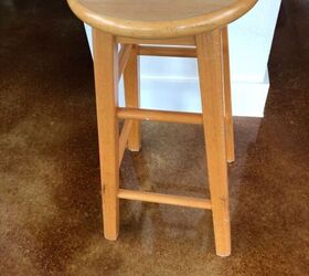 Drag an old stool into your bathroom for this easy, charming storage boost